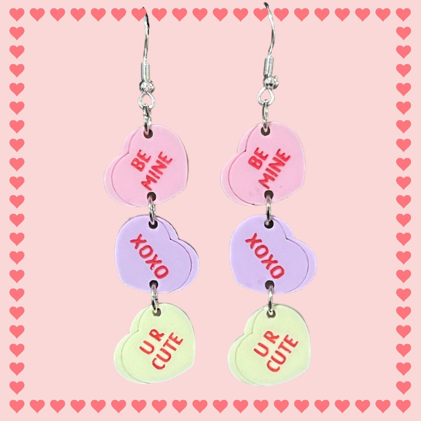 Conversational heart dangle earrings